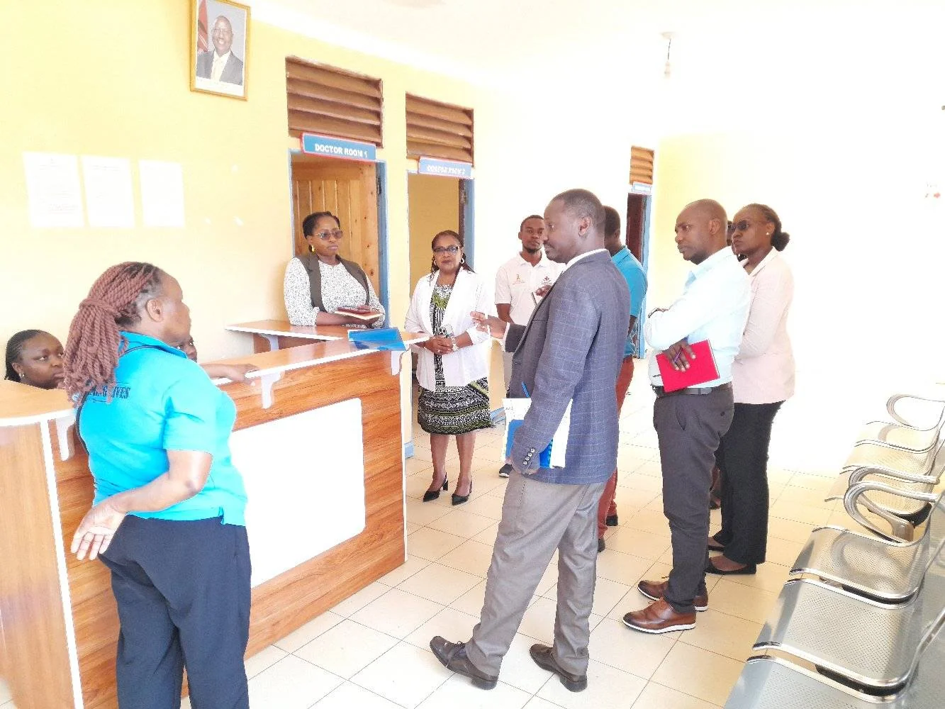 Members of the Cynert Hospital team welcoming visitors